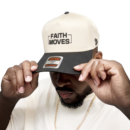Cream and black Faith Moves snapback hat shown on model with bold black logo on front panel and OTTO sticker on curved brim"